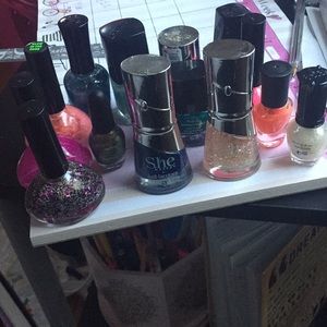 16 unused nail polishes.